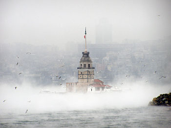 The Maiden's Tower with vapor rising from the ...