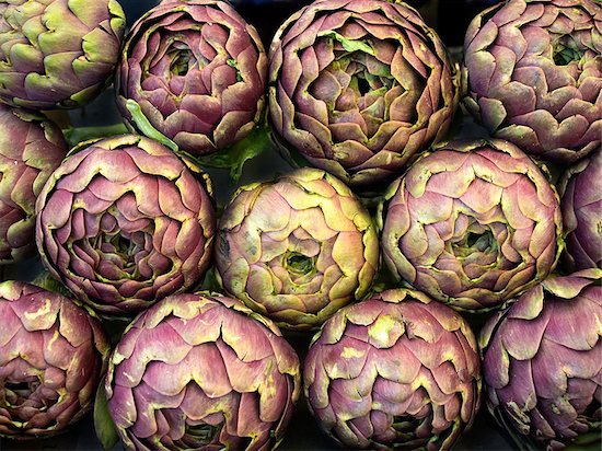 A bunch of artichokes the are at peak freshness to ensure the best flavor.