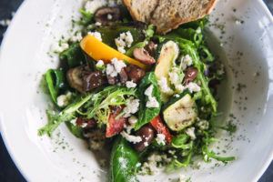 An example of Mediterranean meals: a green salad with feta cheese. 