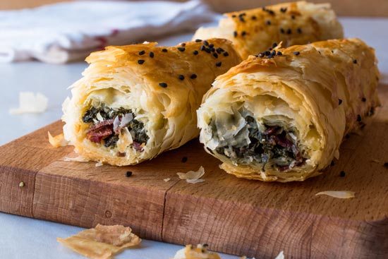 Flaky Turkish pastry which has been rolled and baked to a crisp finish.